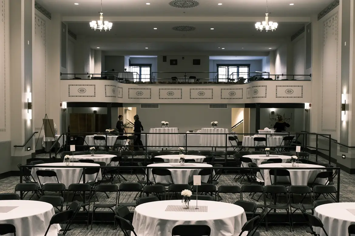 main dawn theater event space with circular tables and white table clothes