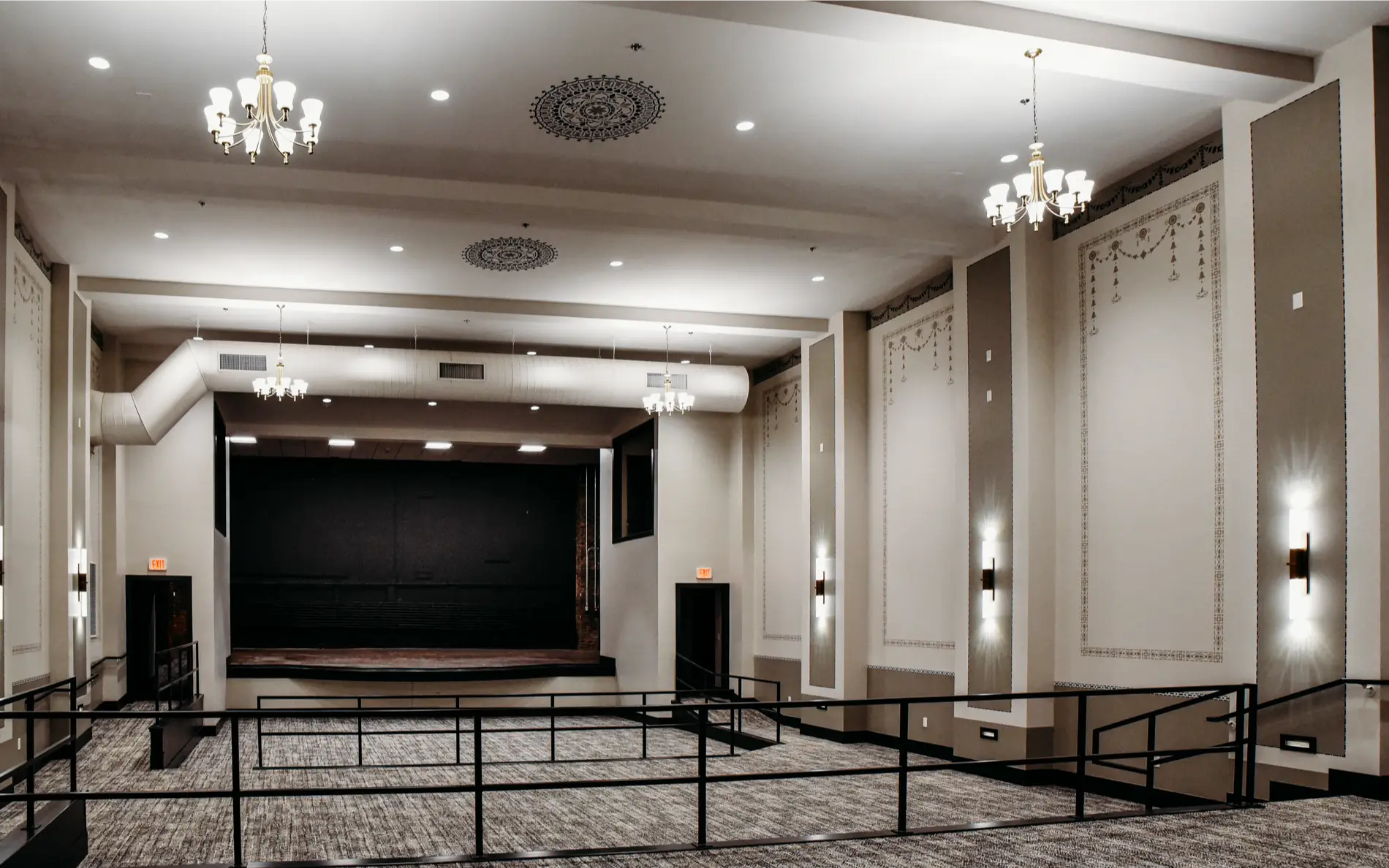 the dawn theater main event space with stenciling detail on the ceiling and walls