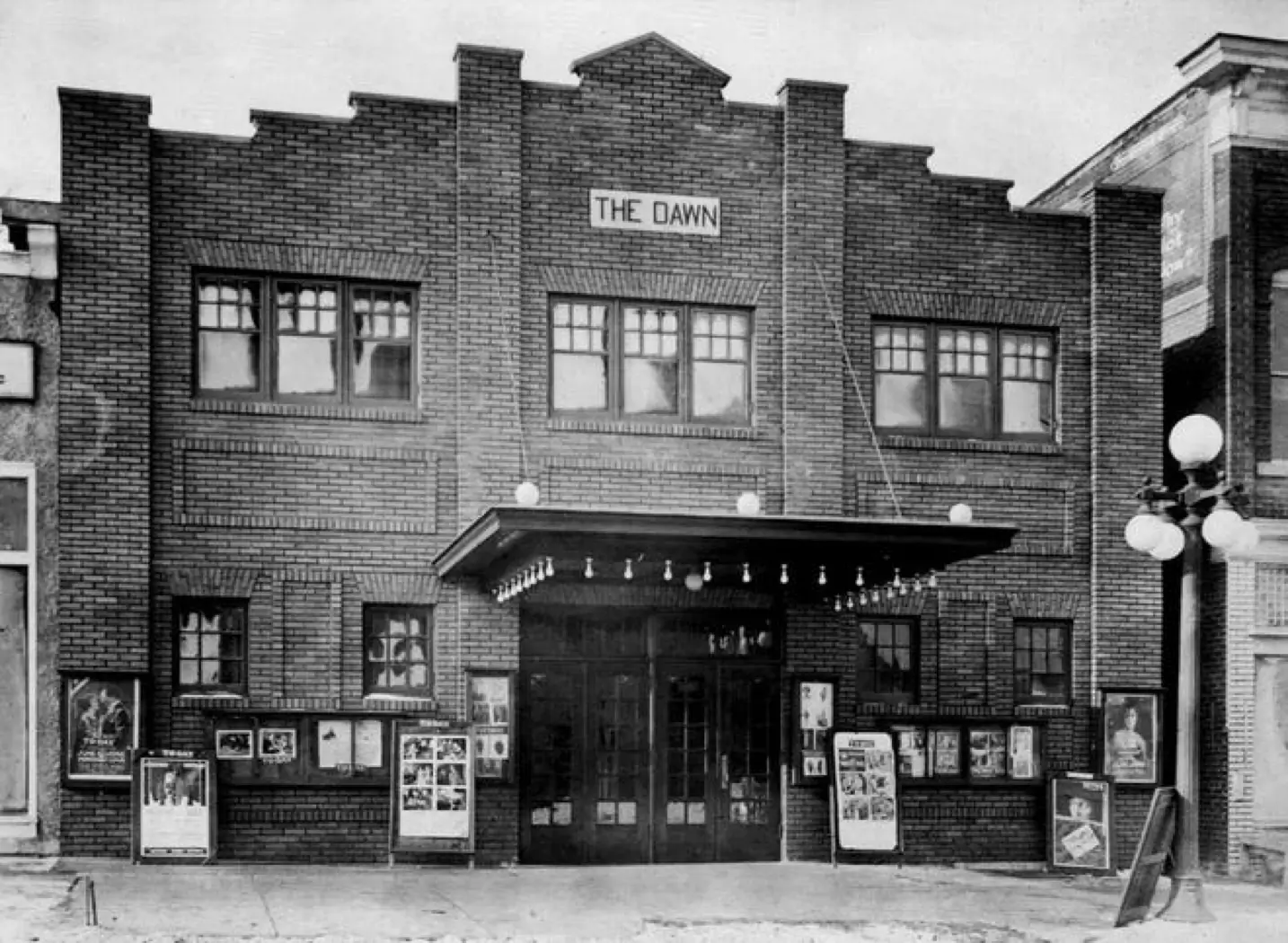 exterior of the original dawn theater from the early 1900s
